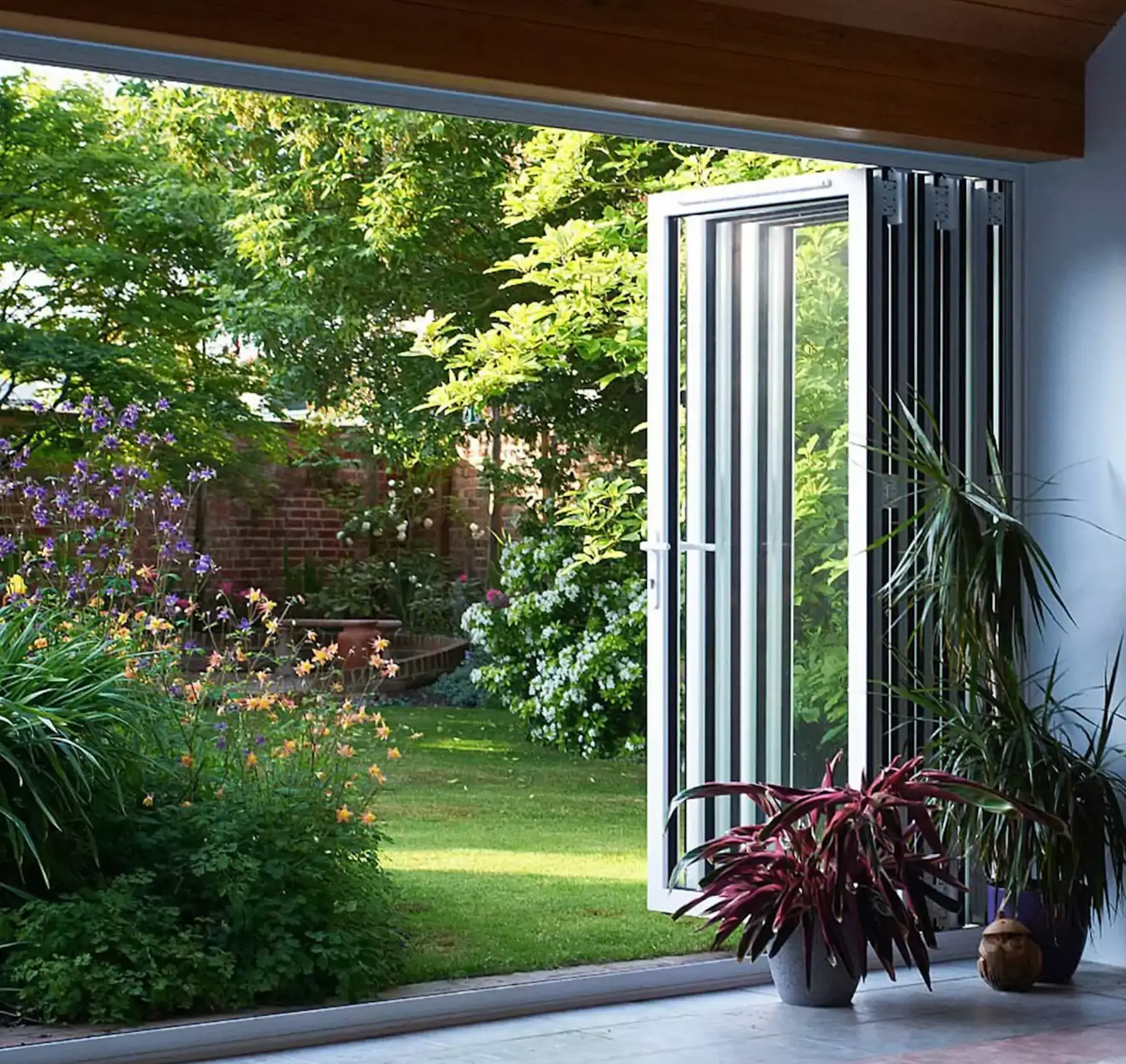white aluminium bifold doors